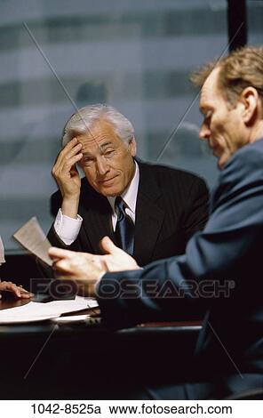 meeting, men, headache, talking, listening, conference, stress View Large Photo Image Stock Image - meeting, men, headache, talking, listening, conference, stress. Fotosearch