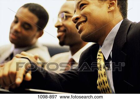 meeting, men, profile, business, businessmen, trio, African-American View Large Photo Image Stock Photo - meeting, men, profile, business, businessmen, trio, African-American. Fotosearch