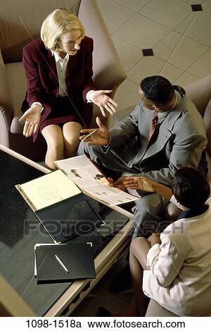 Stock Image - meeting, multiethnic, people, consultation, consulting, business, executives. Fotosearch