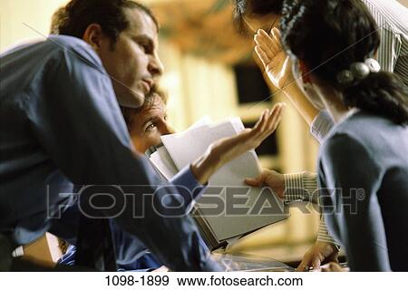 meeting, paperwork, discussion, argument, papers, gesturing View Large Photo Image Stock Photo - meeting, paperwork, discussion, argument, papers, gesturing. Fotosearch
