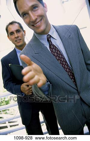 men, business, smile, anticipation, beginnings, businessmen, indoors View Large Photo Image Stock Photo - men, business, smile, anticipation, beginnings, businessmen, indoors. Fotosearch