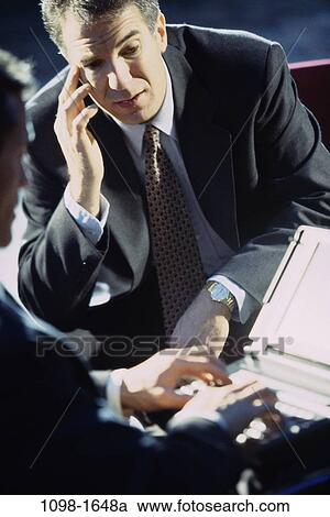 Stock Image - men, mistake, laptop, stress, business, Middle-aged, serious. Fotosearch