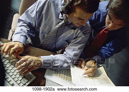 men, people, desk, headset, coworkers, typing, consulting View Large Photo Image Stock Image - men, people, desk, headset, coworkers, typing, consulting. Fotosearch