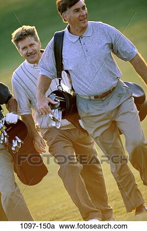 men, people, walking, golf, outdoors, sports, carrying View Large Photo Image Stock Image - men, people, walking, golf, outdoors, sports, carrying. Fotosearch