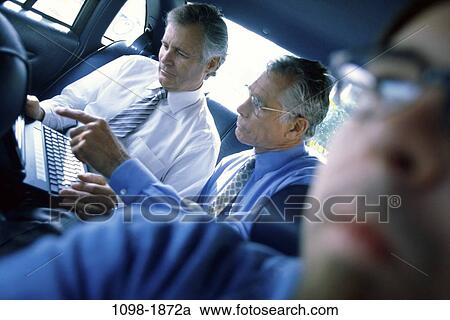 men, talking, discussion, conversation, computer, car, laptop View Large Photo Image Stock Image - men, talking, discussion, conversation, computer, car, laptop. Fotosearch