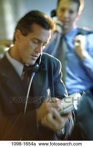 Stock Image - men, talking, listening, business, Middle-aged, planning, businessmen. Fotosearch