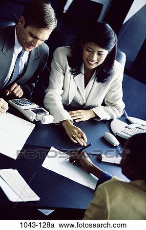 Stock Image - multiethnic, groups, desk, consultation, business, concepts, Middle-aged. Fotosearch