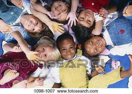 multiethnic, groups, overhead, people, smiling, happy, laughing View Large Photo Image Stock Photo - multiethnic, groups, overhead, people, smiling, happy, laughing. Fotosearch
