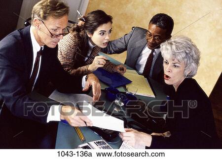 Stock Image - multiethnic, groups, stress, business, chaotic, Middle-aged, executives. Fotosearch