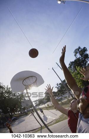 multiethnic, men, people, playing, ball, outdoors, sports View Large Photo Image Stock Image - multiethnic, men, people, playing, ball, outdoors, sports. Fotosearch