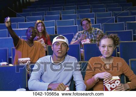 multiethnic, people, eating, theater, popcorn, watch View Large Photo Image Stock Image - multiethnic, people, eating, theater, popcorn, watch. Fotosearch