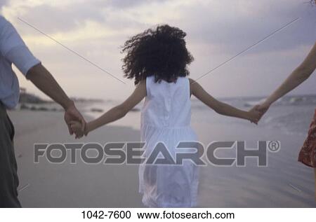 multiethnic, people, hands, walking, beach, holding View Large Photo Image Stock Image - multiethnic, people, hands, walking, beach, holding. Fotosearch