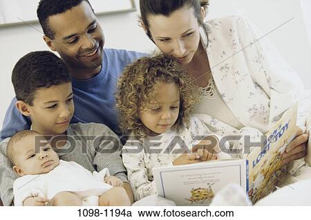 multiethnic, people, reading, book, family, children View Large Photo Image Stock Image - multiethnic, people, reading, book, family, children. Fotosearch