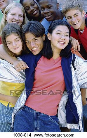 Picture - multiethnic, people, smiling, happy, playful, outdoors, emotions. Fotosearch