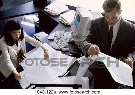 multiethnic, printout, desk, coworkers, paperwork, papers View Large Photo Image Stock Image - multiethnic, printout, desk, coworkers, paperwork, papers. Fotosearch
