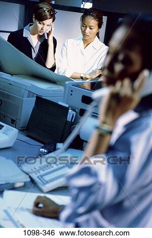 multiethnic, women, desk, telephone, phone, stress, business View Large Photo Image Stock Photograph - multiethnic, women, desk, telephone, phone, stress, business. Fotosearch