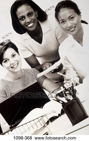 multiethnic, women, laptop, business, Middle-aged, teamwork, diversity View Large Photo Image Stock Photo - multiethnic, women, laptop, business, Middle-aged, teamwork, diversity. Fotosearch