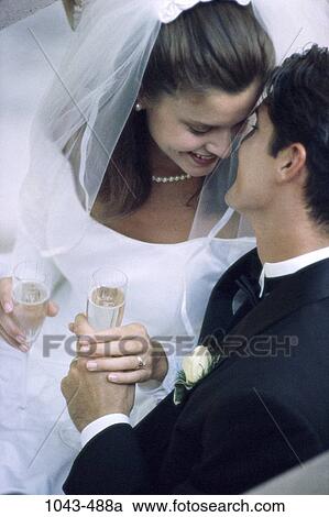 overhead, people, formal, smiling, couple, champagne, holding View Large Photo Image Stock Image - overhead, people, formal, smiling, couple, champagne, holding. Fotosearch