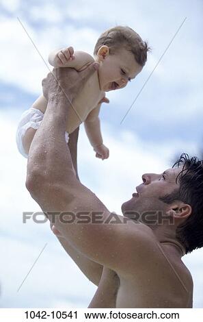 overhead, people, playing, baby, laughing, holding, playful View Large Photo Image Stock Image - overhead, people, playing, baby, laughing, holding, playful. Fotosearch