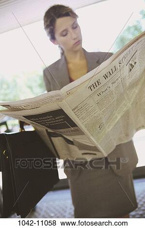 paper, woman, newspaper, briefcase, information, reading, business View Large Photo Image Stock Photo - paper, woman, newspaper, briefcase, information, reading, business. Fotosearch