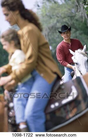 people, animals, riding, outdoors, family, horseback, horses View Large Photo Image Stock Image - people, animals, riding, outdoors, family, horseback, horses. Fotosearch