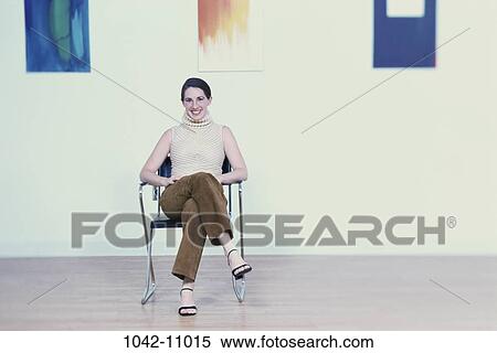 people, art, woman, hanging, sitting, artist, achievement View Large Photo Image Stock Photography - people, art, woman, hanging, sitting, artist, achievement. Fotosearch