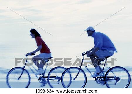 people, beach, outdoors, friends, biking, couples, Middle-aged sports bicycles View Large Photo Image Picture - people, beach, outdoors, friends, biking, couples, Middle-aged sports bicycles. Fotosearch