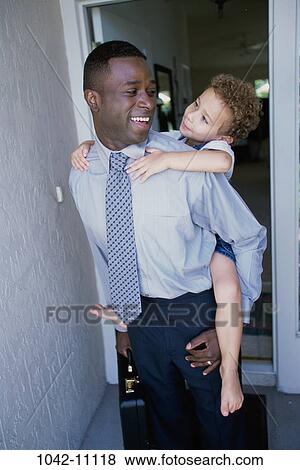 people, briefcase, riding, outdoors, carrying, family View Large Photo Image Stock Photo - people, briefcase, riding, outdoors, carrying, family. Fotosearch