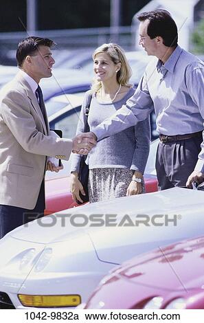 people, car, Middle-aged, shopping, salesman, shop, automotive View Large Photo Image Stock Image - people, car, Middle-aged, shopping, salesman, shop, automotive. Fotosearch