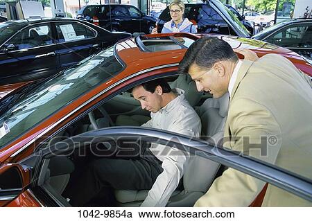 people, car, Middle-aged, shopping, salesman, shop, automotive View Large Photo Image Stock Image - people, car, Middle-aged, shopping, salesman, shop, automotive. Fotosearch