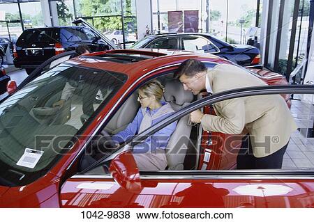 people, car, Middle-aged, shopping, salesman, shop, automotive View Large Photo Image Stock Photo - people, car, Middle-aged, shopping, salesman, shop, automotive. Fotosearch