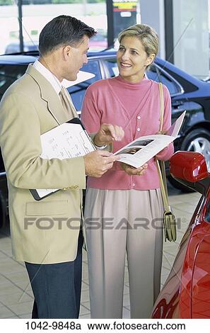 people, car, reading, Middle-aged, shopping, salesman, shop View Large Photo Image Stock Image - people, car, reading, Middle-aged, shopping, salesman, shop. Fotosearch
