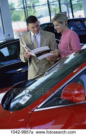 people, car, reading, Middle-aged, shopping, salesman, shop View Large Photo Image Stock Image - people, car, reading, Middle-aged, shopping, salesman, shop. Fotosearch