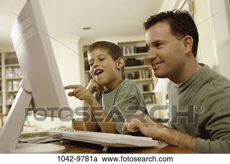 people, computer, family, using, father, brunette View Large Photo Image Stock Image - people, computer, family, using, father, brunette. Fotosearch