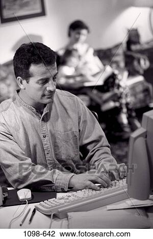 people, computer, typing, foreground, family, father, working View Large Photo Image Stock Image - people, computer, typing, foreground, family, father, working. Fotosearch