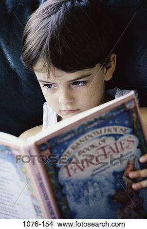 people, concentration, reading, book, concentrating, boy, contemplation View Large Photo Image Picture - people, concentration, reading, book, concentrating, boy, contemplation. Fotosearch