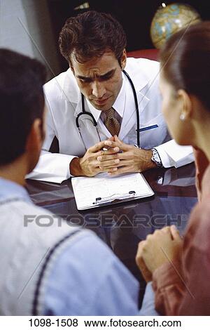 people, consultation, discussion, doctor, diagnosis, anxiety, anxious View Large Photo Image Stock Photo - people, consultation, discussion, doctor, diagnosis, anxiety, anxious. Fotosearch