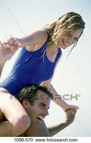 people, couple, beach, laughing, joyous, romance, Caucasian View Large Photo Image Stock Image - people, couple, beach, laughing, joyous, romance, Caucasian. Fotosearch