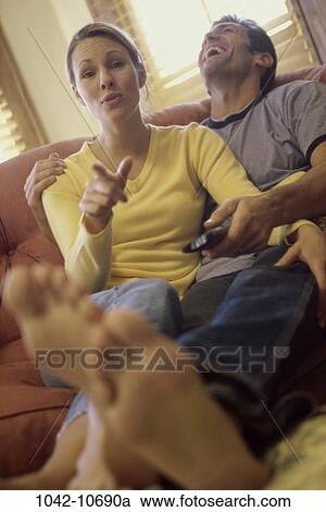 people, couple, entertainment, television, funny, humor, brunette View Large Photo Image Stock Image - people, couple, entertainment, television, funny, humor, brunette. Fotosearch