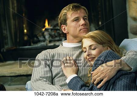 people, couple, fireplace, romantic, tranquility, Middle-aged, hugging View Large Photo Image Stock Image - people, couple, fireplace, romantic, tranquility, Middle-aged, hugging. Fotosearch