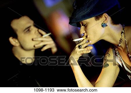 people, couple, health, smoking, indulgence, vice, tattoo View Large Photo Image Stock Image - people, couple, health, smoking, indulgence, vice, tattoo. Fotosearch