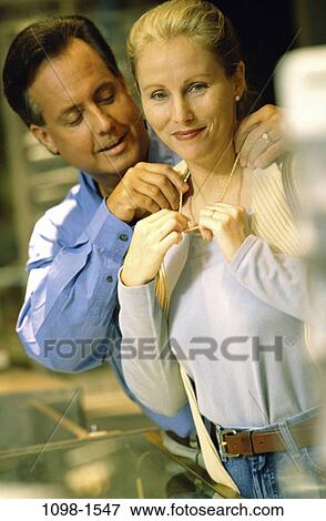 people, couple, jewelry, necklace, Middle-aged, shopping, gift View Large Photo Image Stock Photo - people, couple, jewelry, necklace, Middle-aged, shopping, gift. Fotosearch