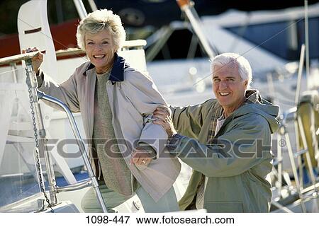 Stock Photo - people, couple, senior, boating, lifestyles, outdoors, boat. Fotosearch