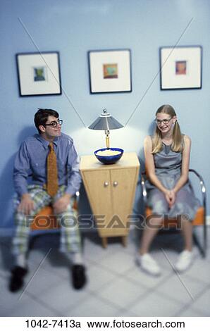 Stock Image - people, couple, sitting, individuality, anticipation, waiting, teens. Fotosearch