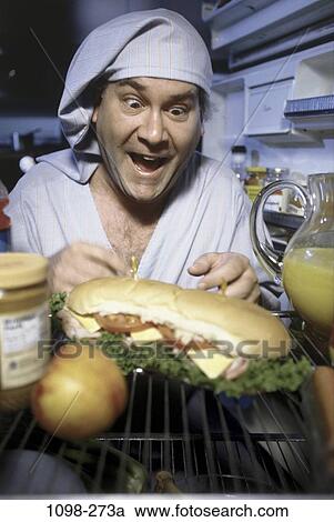 people, eating, excitement, excited, refrigerator, Middle-aged View Large Photo Image Stock Image - people, eating, excitement, excited, refrigerator, Middle-aged. Fotosearch