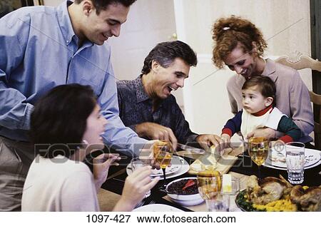 people, eating, glasses, table, wine, Hispanic View Large Photo Image Stock Photo - people, eating, glasses, table, wine, Hispanic. Fotosearch