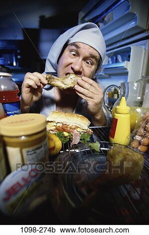 people, eating, night, chicken, refrigerator, Middle-aged View Large Photo Image Stock Image - people, eating, night, chicken, refrigerator, Middle-aged. Fotosearch