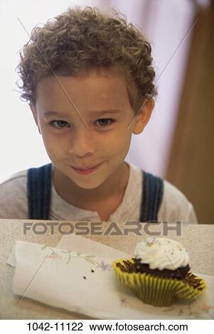 people, eating, smiling, boy, smile, child, snack View Large Photo Image Stock Image - people, eating, smiling, boy, smile, child, snack. Fotosearch