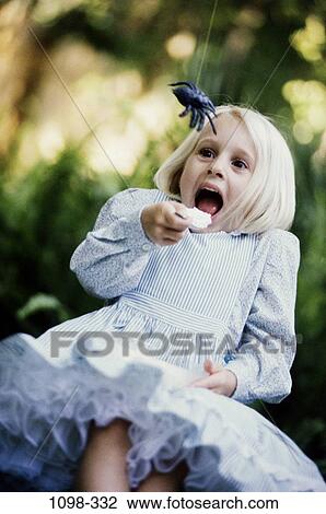 people, eating, spider, girl, outdoors, child, blond View Large Photo Image Stock Image - people, eating, spider, girl, outdoors, child, blond. Fotosearch