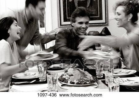 people, eating, Turkey, party, smiling, sitting, Hispanic View Large Photo Image Stock Photograph - people, eating, Turkey, party, smiling, sitting, Hispanic. Fotosearch